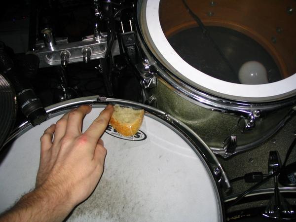 Kevin taped bread to his snare head to dampen the sound.